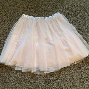 Black top with pink Tull skirt